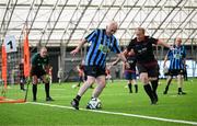14 June 2025; Aidan Hand of Athlone Town in action against Aidan Moloney of Drogheda United during the League of Ireland Walking Football Festival at the National Indoor Arena on the Sport Ireland Campus in Dublin. Photo by Stephen McCarthy/Sportsfile