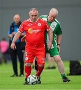 14 June 2025; Pat Daly of Shelbourne in action against Rory Mahon of Bray Wanderers during the League of Ireland Walking Football Festival at the National Indoor Arena on the Sport Ireland Campus in Dublin. Photo by Stephen McCarthy/Sportsfile