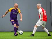 14 June 2025; Mark Beckett of Wexford in action against John McIntyre of St Patrick's Athletic during the League of Ireland Walking Football Festival at the National Indoor Arena on the Sport Ireland Campus in Dublin. Photo by Stephen McCarthy/Sportsfile