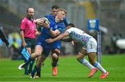 14 June 2025; Tommy O'Brien of Leinster is tackled by Willie le Roux of Vodacom Bulls during the United Rugby Championship Grand Final match between Leinster and Vodacom Bulls at Croke Park in Dublin. Photo by Brendan Moran/Sportsfile