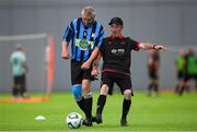 14 June 2025; Gerard Coddington of Drogheda United in action against Gerry McHugh of Athlone Town during the League of Ireland Walking Football Festival at the National Indoor Arena on the Sport Ireland Campus in Dublin. Photo by Stephen McCarthy/Sportsfile