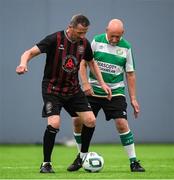 14 June 2025; Gerry Black of Bohemians in action against Larry Brophy of Shamrock Rovers during the League of Ireland Walking Football Festival at the National Indoor Arena on the Sport Ireland Campus in Dublin. Photo by Stephen McCarthy/Sportsfile