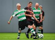 14 June 2025; Declan of Shamrock Rovers in action against Gerry Black of Bohemians during the League of Ireland Walking Football Festival at the National Indoor Arena on the Sport Ireland Campus in Dublin. Photo by Stephen McCarthy/Sportsfile