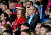14 June 2025; An Taoiseach Míchéal Martin TD, along with his wife Mary watch on during the GAA Football All-Ireland Senior Championship Round 3 match between Roscommon and Cork at Laois Hire O'Moore Park in Portlaoise, Laois. Photo by Daire Brennan/Sportsfile