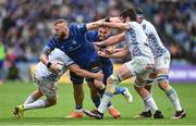 14 June 2025; RG Snyman of Leinster is tackled by JF van Heerden of Vodacom Bulls during the United Rugby Championship Grand Final match between Leinster and Vodacom Bulls at Croke Park in Dublin. Photo by David Fitzgerald/Sportsfile