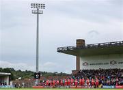 14 June 2025; The Derry team stands for the playing of Amhrán na bhFiann before the GAA Football All-Ireland Senior Championship Round 3 match between Dublin and Derry at Páirc Esler in Newry, Down. Photo by Thomas Flinkow/Sportsfile