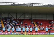 14 June 2025; The Dublin team stands for the playing of Amhrán na bhFiann before the GAA Football All-Ireland Senior Championship Round 3 match between Dublin and Derry at Páirc Esler in Newry, Down. Photo by Thomas Flinkow/Sportsfile
