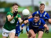 14 June 2025; Seán Rafferty of Meath is tackled by Graham O'Sullivan of Kerry during the GAA Football All-Ireland Senior Championship Round 3 match between Kerry and Meath at Glenisk O'Connor Park in Tullamore, Offaly. Photo by Tom Beary/Sportsfile