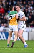 14 June 2025; Alex Beirne of Kildare and John Furlong of Offaly tussle before the Tailteann Cup quarter-final match between Kildare and Offaly at Cedral St Conleth's Park in Newbridge, Kildare. Photo by Piaras Ó Mídheach/Sportsfile