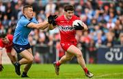 14 June 2025; Padraig McGrogan of Derry in action against Con O'Callaghan of Dublin during the GAA Football All-Ireland Senior Championship Round 3 match between Dublin and Derry at Páirc Esler in Newry, Down. Photo by Ramsey Cardy/Sportsfile