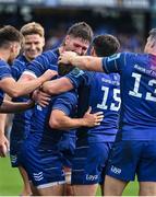 14 June 2025; Fintan Gunne of Leinster, centre, is congratulated by teammates after scoring his side's fourth try during the United Rugby Championship Grand Final match between Leinster and Vodacom Bulls at Croke Park in Dublin. Photo by David Fitzgerald/Sportsfile