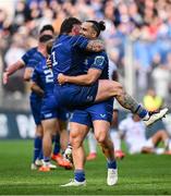 14 June 2025; Andrew Porter of Leinster, left, celebrates with team-mate James Lowe at the final whistle of the United Rugby Championship Grand Final match between Leinster and Vodacom Bulls at Croke Park in Dublin. Photo by Seb Daly/Sportsfile