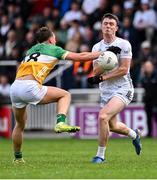 14 June 2025; Alex Beirne of Kildare in action against Jack McEvoy of Offaly during the Tailteann Cup quarter-final match between Kildare and Offaly at Cedral St Conleth's Park in Newbridge, Kildare. Photo by Piaras Ó Mídheach/Sportsfile