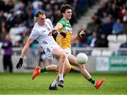 14 June 2025; Ryan Sinkey of Kildare in action against Cillian Bourke of Offaly during the Tailteann Cup quarter-final match between Kildare and Offaly at Cedral St Conleth's Park in Newbridge, Kildare. Photo by Piaras Ó Mídheach/Sportsfile