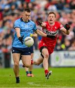 14 June 2025; Con O'Callaghan of Dublin in action against Brendan Rogers of Derry during the GAA Football All-Ireland Senior Championship Round 3 match between Dublin and Derry at Páirc Esler in Newry, Down. Photo by Ramsey Cardy/Sportsfile