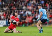 14 June 2025; Niall Loughlin of Derry in action against Brian Howard of Dublin during the GAA Football All-Ireland Senior Championship Round 3 match between Dublin and Derry at Páirc Esler in Newry, Down. Photo by Thomas Flinkow/Sportsfile