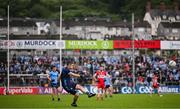 14 June 2025; Dublin goalkeeper Stephen Cluxton  kicks a free during the GAA Football All-Ireland Senior Championship Round 3 match between Dublin and Derry at Páirc Esler in Newry, Down. Photo by Ramsey Cardy/Sportsfile