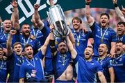 14 June 2025; Leinster captain Jack Conan, centre, alongside team-mates Caelan Doris, left, and Cian Healy, right, lift the cup after their side's victory in the United Rugby Championship Grand Final match between Leinster and Vodacom Bulls at Croke Park in Dublin. Photo by David Fitzgerald/Sportsfile