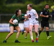 14 June 2025; Aoibhín Cleary of Meath is tackled by Aoife Rattigan of Kildare during the TG4 All-Ireland Ladies Football Senior Championship Round 3 match between Kildare and Meath at Manguard Plus Kildare GAA Centre of Excellence in Newbridge, Kildare. Photo by Ray McManus/Sportsfile