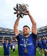 14 June 2025; Ross Byrne of Leinster celebrates with the trophy after the United Rugby Championship Grand Final match between Leinster and Vodacom Bulls at Croke Park in Dublin. Photo by Seb Daly/Sportsfile