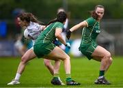 14 June 2025; Claire Sullivan of Kildare in action against Marion Farrelly and Emma Duggan of Meath during the TG4 All-Ireland Ladies Football Senior Championship Round 3 match between Kildare and Meath at Manguard Plus Kildare GAA Centre of Excellence in Newbridge, Kildare. Photo by Ray McManus/Sportsfile