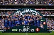 14 June 2025; Leinster captain Jack Conan, centre, with team-mates Caelan Doris, left, and Cian Healy lift the cup after the United Rugby Championship Grand Final match between Leinster and Vodacom Bulls at Croke Park in Dublin. Photo by Brendan Moran/Sportsfile