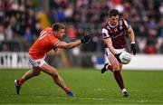 14 June 2025; Shane Walsh of Galway in action against Rian O'Neill of Armagh during the GAA Football All-Ireland Senior Championship Round 3 match between Galway and Armagh at Kingspan Breffni in Cavan. Photo by Ben McShane/Sportsfile