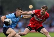 14 June 2025; Con O'Callaghan of Dublin in action against Brendan Rogers of Derry during the GAA Football All-Ireland Senior Championship Round 3 match between Dublin and Derry at Páirc Esler in Newry, Down. Photo by Thomas Flinkow/Sportsfile