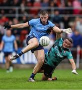 14 June 2025; Sean Bugler of Dublin in action against Derry goalkeeper Ben McKinless during the GAA Football All-Ireland Senior Championship Round 3 match between Dublin and Derry at Páirc Esler in Newry, Down. Photo by Thomas Flinkow/Sportsfile