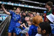 14 June 2025; Jordie Barrett of Leinster with supporters after the United Rugby Championship Grand Final match between Leinster and Vodacom Bulls at Croke Park in Dublin. Photo by David Fitzgerald/Sportsfile