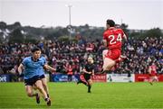 14 June 2025; Cahir McMonagle of Derry in action against David Byrne of Dublin during the GAA Football All-Ireland Senior Championship Round 3 match between Dublin and Derry at Páirc Esler in Newry, Down. Photo by Ramsey Cardy/Sportsfile