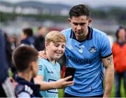 14 June 2025; David Byrne of Dublin takes a photo with a supporter after the GAA Football All-Ireland Senior Championship Round 3 match between Dublin and Derry at Páirc Esler in Newry, Down. Photo by Thomas Flinkow/Sportsfile