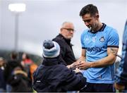 14 June 2025; David Byrne of Dublin signs a supporter's jersey after his side's victory in the GAA Football All-Ireland Senior Championship Round 3 match between Dublin and Derry at Páirc Esler in Newry, Down. Photo by Thomas Flinkow/Sportsfile