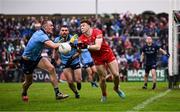 14 June 2025; Lachlan Murray of Derry in action against Peadar Ó Cofaigh Byrne of Dublin during the GAA Football All-Ireland Senior Championship Round 3 match between Dublin and Derry at Páirc Esler in Newry, Down. Photo by Ramsey Cardy/Sportsfile
