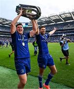 14 June 2025; Leinster players Dan Sheehan, left, and Ross Byrne celebrate with the cup after the United Rugby Championship Grand Final match between Leinster and Vodacom Bulls at Croke Park in Dublin. Photo by Seb Daly/Sportsfile