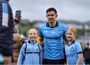 14 June 2025; David Byrne of Dublin has his photo taken with supporters after the GAA Football All-Ireland Senior Championship Round 3 match between Dublin and Derry at Páirc Esler in Newry, Down. Photo by Thomas Flinkow/Sportsfile