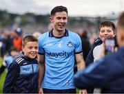 14 June 2025; David Byrne of Dublin has his photo taken with supporters after the GAA Football All-Ireland Senior Championship Round 3 match between Dublin and Derry at Páirc Esler in Newry, Down. Photo by Thomas Flinkow/Sportsfile