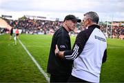 14 June 2025; Armagh manager Kieran McGeeney, left, and Galway manager Pádraic Joyce shake hands after the GAA Football All-Ireland Senior Championship Round 3 match between Galway and Armagh at Kingspan Breffni in Cavan. Photo by Ben McShane/Sportsfile