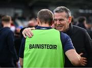 14 June 2025; Kildare manager Brian Flanagan celebrates with former Kildare footballer Ken Doyle, right, after the Tailteann Cup quarter-final match between Kildare and Offaly at Cedral St Conleth's Park in Newbridge, Kildare. Photo by Piaras Ó Mídheach/Sportsfile