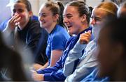 14 June 2025; Emma Kelly, centre, and team-mates during a presentation before a Leinster women's rugby squad training session at Wanderers Rugby Club in Dublin. Photo by Shauna Clinton/Sportsfile