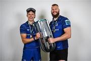 14 June 2025; Sam Prendergast, left, and RG Snyman of Leinster celebrate with the URC trophy after the United Rugby Championship Grand Final match between Leinster and Vodacom Bulls at Croke Park in Dublin. Photo by Brendan Moran/Sportsfile