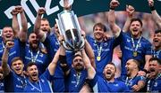 14 June 2025; Leinster captain Jack Conan, centre, alongside team-mates Caelan Doris, left, and Cian Healy, right, lift the cup after their side's victory in the United Rugby Championship Grand Final match between Leinster and Vodacom Bulls at Croke Park in Dublin. Photo by David Fitzgerald/Sportsfile