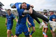 14 June 2025; RG Snyman of Leinster carries teammate Jamison Gibson-Park as they celebrate after the United Rugby Championship Grand Final match between Leinster and Vodacom Bulls at Croke Park in Dublin. Photo by Brendan Moran/Sportsfile