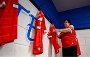 15 June 2025; Louth kitwoman Mary Reynolds hangs jerseys in the dressing room before the GAA Football All-Ireland Senior Championship Round 3 match between Louth and Clare at Laois Hire O'Moore Park in Portlaoise, Laois. Photo by Shauna Clinton/Sportsfile