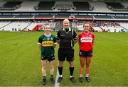 14 June 2025; Referee Shane Curley with Kerry Captain Cait Lynch, left, and Cork captain Sarah Leahy before the TG4 All-Ireland Ladies Football Senior Championship Round 2 match between Cork and Kerry at Supervalu Páirc Uí Chaoimh in Cork. Photo by Michael P Ryan/Sportsfile