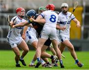 14 June 2025; Jason Forde of Tipperary in action against David Dooley, left, and Fiachra C Fennell of Laois during the GAA Hurling All-Ireland Senior Championship Round 1 match between Laois and Tipperary at Laois Hire O'Moore in Portlaoise, Laois. Photo by Daire Brennan/Sportsfile