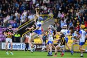 14 June 2025; Tommy Kennedy of Waterford in action against Eoin Brennan of Kilkenny during the Electric Ireland GAA All-Ireland Minor Championship semi-final match between Kilkenny and Waterford Chadwicks Wexford Park in Wexford. Photo by Matt Browne/Sportsfile