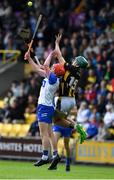 14 June 2025; Darragh Keane of Waterford in action against Cian Byrne of Kilkenny during the Electric Ireland GAA All-Ireland Minor Championship semi-final match between Kilkenny and Waterford Chadwicks Wexford Park in Wexford. Photo by Matt Browne/Sportsfile