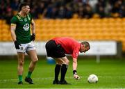 14 June 2025; Jordan Morris of Meath prepares to take a free as referee Joe Mc Quillan uses vanishing spray during the GAA Football All-Ireland Senior Championship Round 3 match between Kerry and Meath at Glenisk O'Connor Park in Tullamore, Offaly. Photo by Tom Beary/Sportsfile