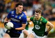 14 June 2025; David Clifford of Kerry in action against Seán Rafferty of Meath during the GAA Football All-Ireland Senior Championship Round 3 match between Kerry and Meath at Glenisk O'Connor Park in Tullamore, Offaly. Photo by Tom Beary/Sportsfile